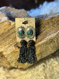 Turquoise and gunmetal-tone seed bead tassel earrings with ornate silver-tone tops