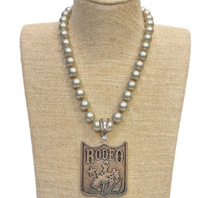 Rodeo (Horse Rider) Pendant On Faux Navajo Pearl Necklace