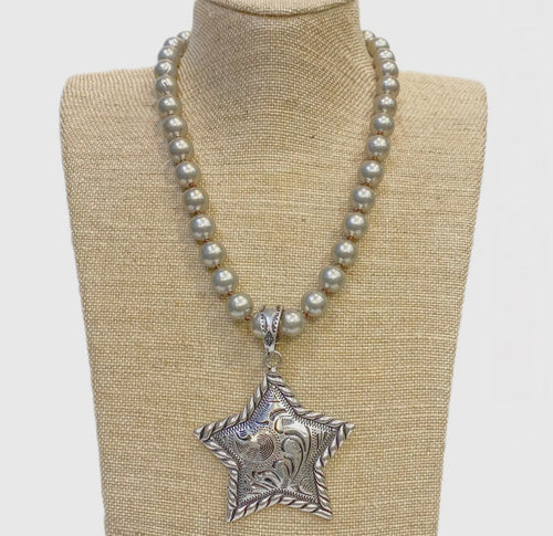 Silver Metal Star Pendant On Faux Navajo Pearl Necklace