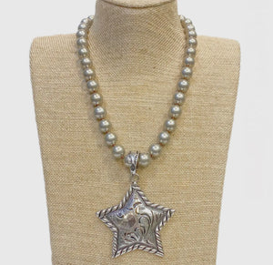 Silver Metal Star Pendant On Faux Navajo Pearl Necklace