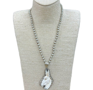 Carved Bone "Dash the Donkey" On 6mm Faux Navajo Pearl