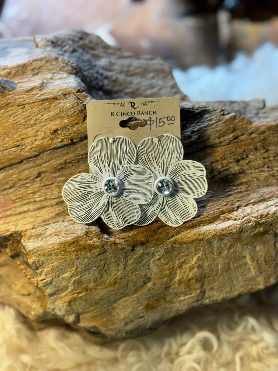 Ivory bow statement earrings with jeweled centers