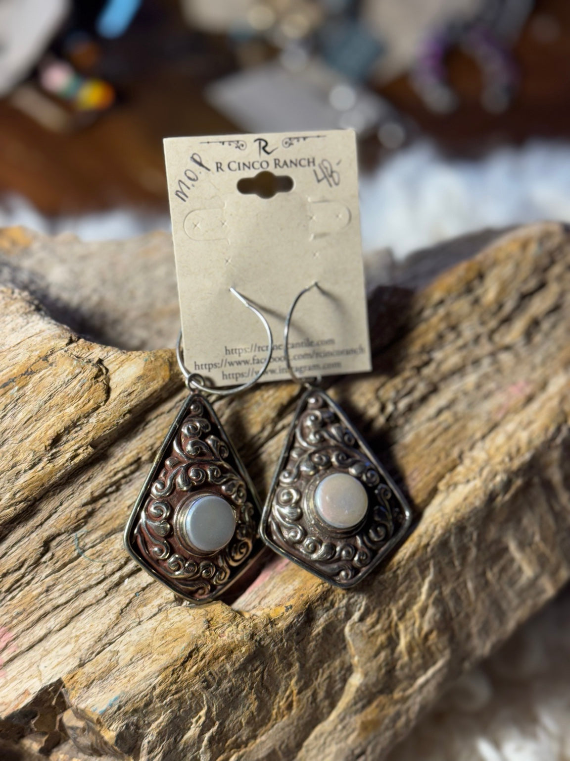 Teardrop genuine mother-of-pearl earrings in German silver