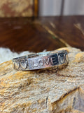 Speak It. Wear It. Stretch Bracelet: Love