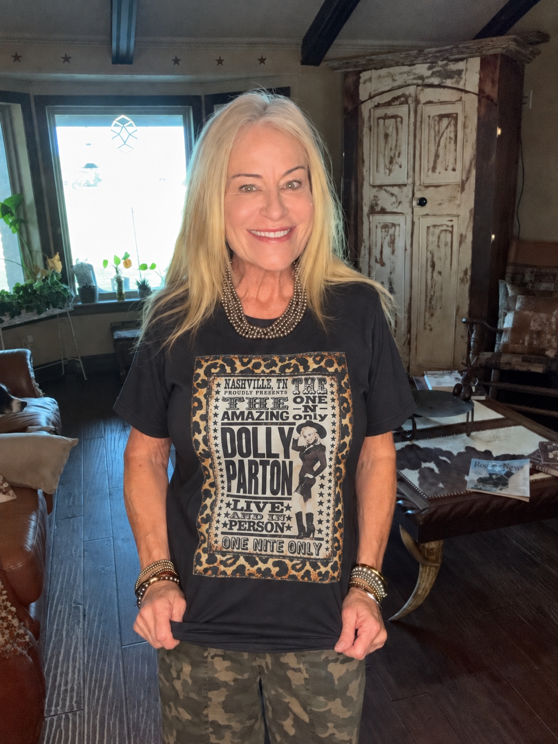 Kimberly modeling the black Amazing Dolly Live graphic tee