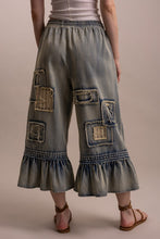 Back view of Blue Velvet patchwork ruffle hem cropped pants
