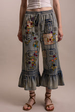 Front view of Blue Velvet embroidered patchwork ruffle hem cropped pants