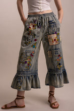 Full front view of Blue Velvet embroidered patchwork ruffle hem pants