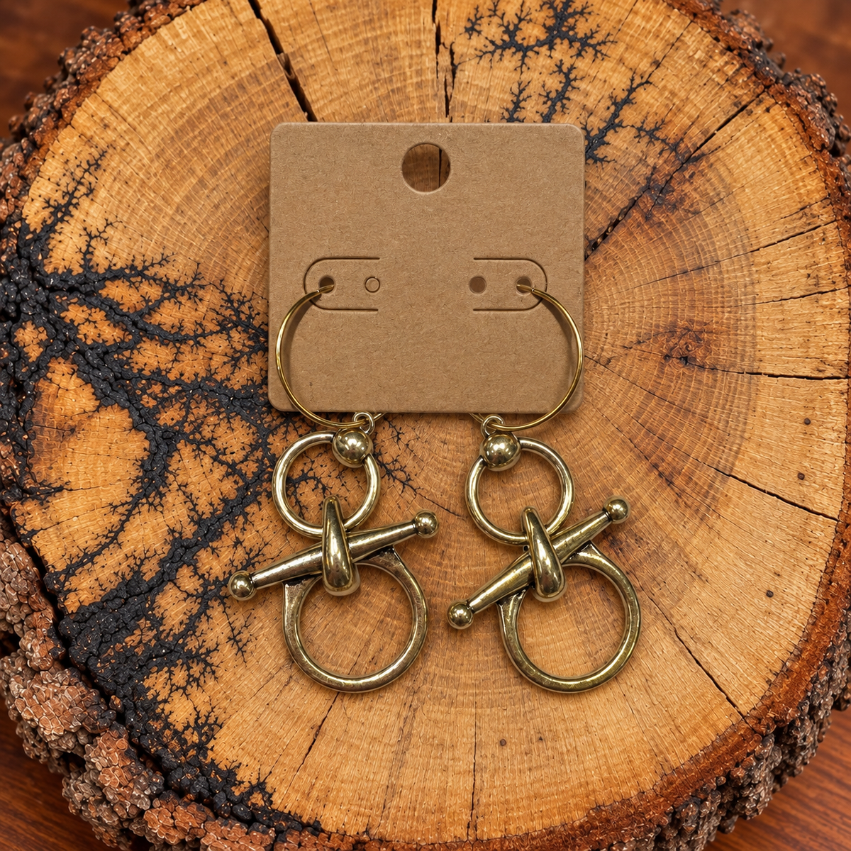 Snaffle Bit Hoop Earrings – Gold-Tone on a plain kraft card