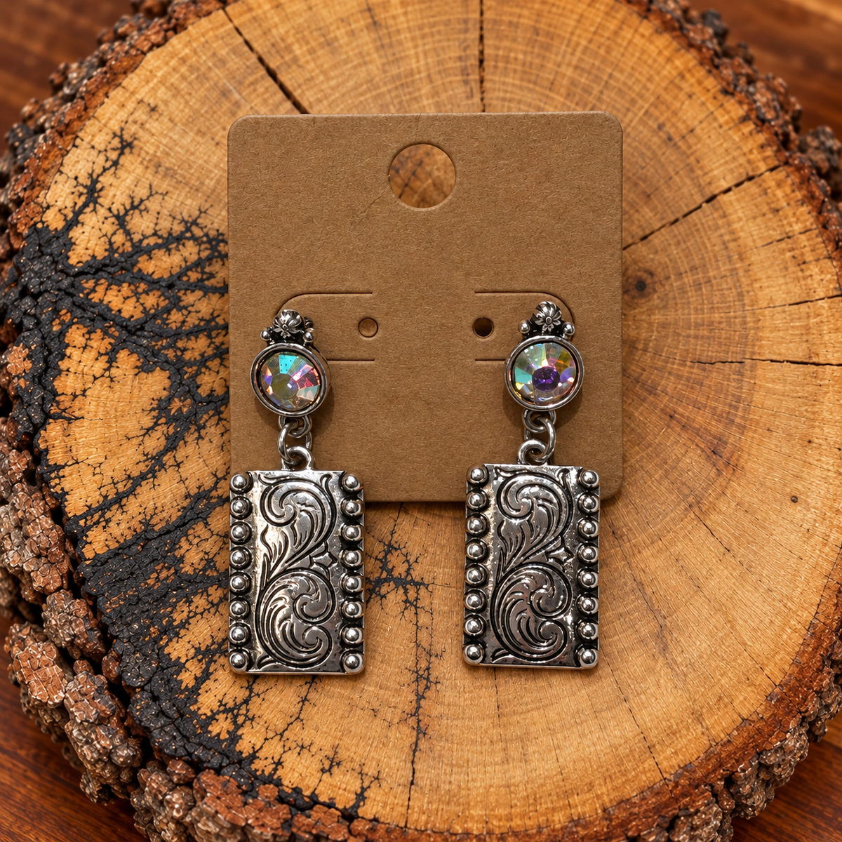 Western Scroll Rectangle Crystal Drop Earrings on a plain kraft card