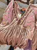 Embroidered velvet tunic with pink floral details and purple trim, brightened photo