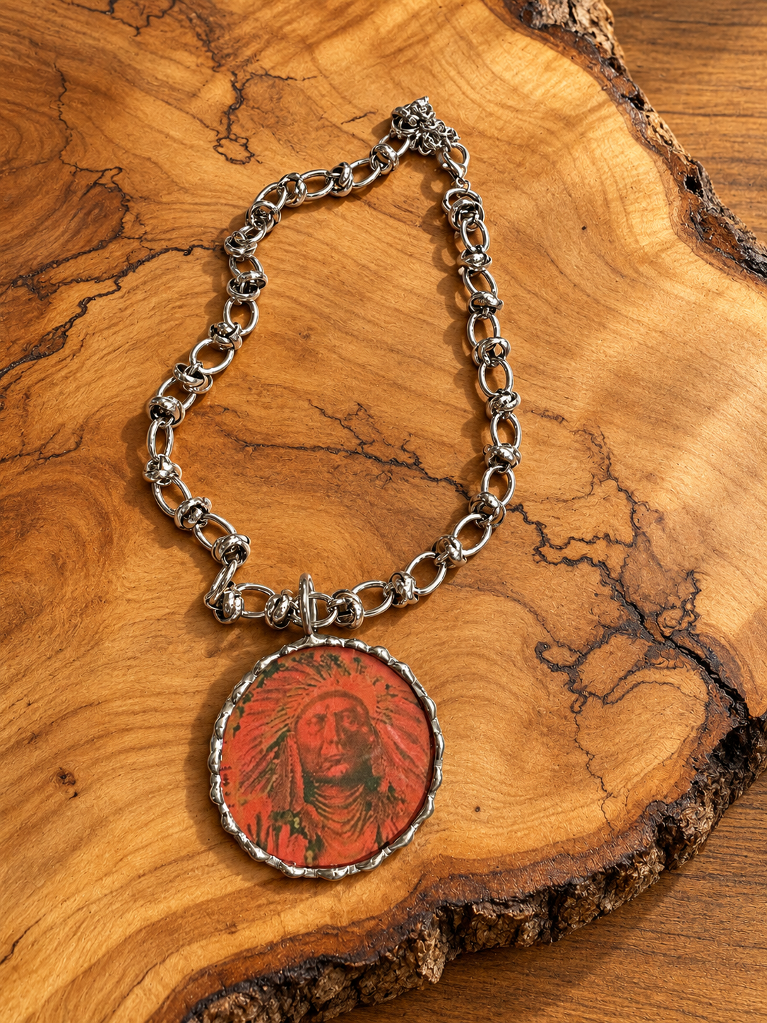 Red Portrait Hand-Soldered Statement Necklace on natural wood