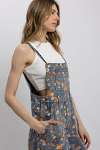 Free Spirit floral denim overalls side pocket detail