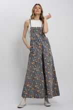 Free Spirit floral wide-leg denim overalls styled front view
