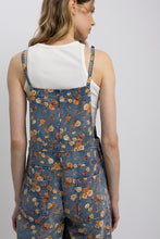 Free Spirit floral denim overalls back pocket detail