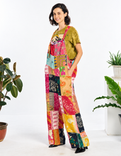 Front view of colorful one-size Kantha cotton patchwork jumpsuit with pockets