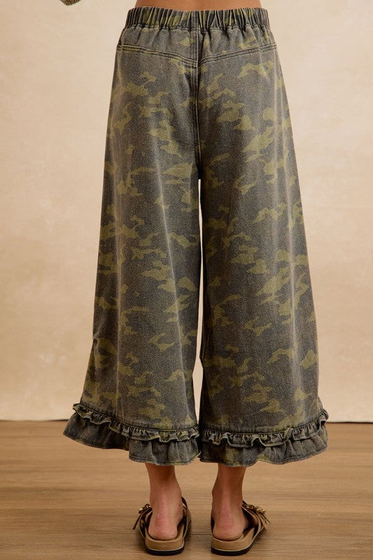 Back view showing elastic waistband of BIBI camouflage ruffle hem wide-leg pants