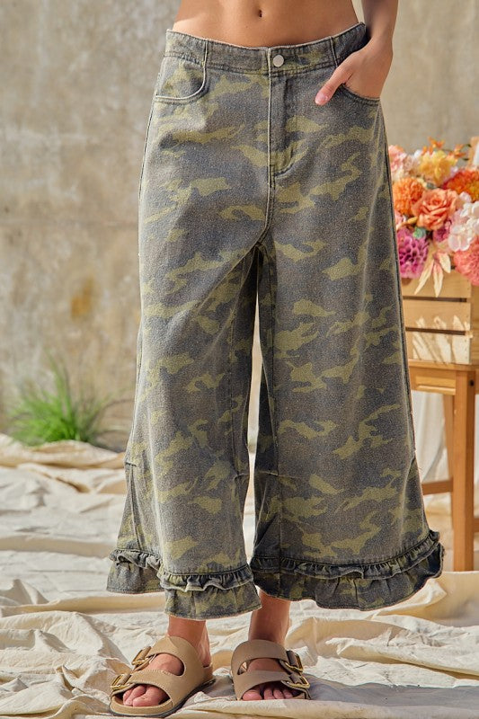 Front pocket view of BIBI camouflage ruffle hem wide-leg pants