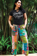 Model wearing Heritage reversible Kantha patchwork pants with the Dirty Hippie black graphic tee