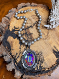 Iridescent oval crystal pendant necklace with hand-knotted silver metal beads