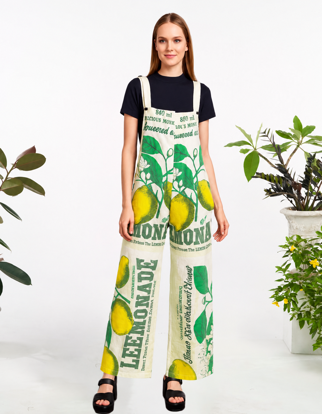 Model wearing the full-length Lemonade vintage feed sack wide-leg jumpsuit