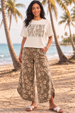 Model wearing Daisy Drift tulip pants with Ol Lady tee