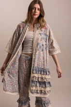Open front view of Peace and Patchwork tiered ruffle duster