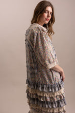 Side view of Peace and Patchwork tiered ruffle duster