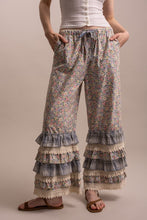 Full front view of Peace and Patchwork floral ruffle pants