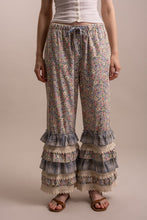 Straight front view of Peace and Patchwork ruffle pants