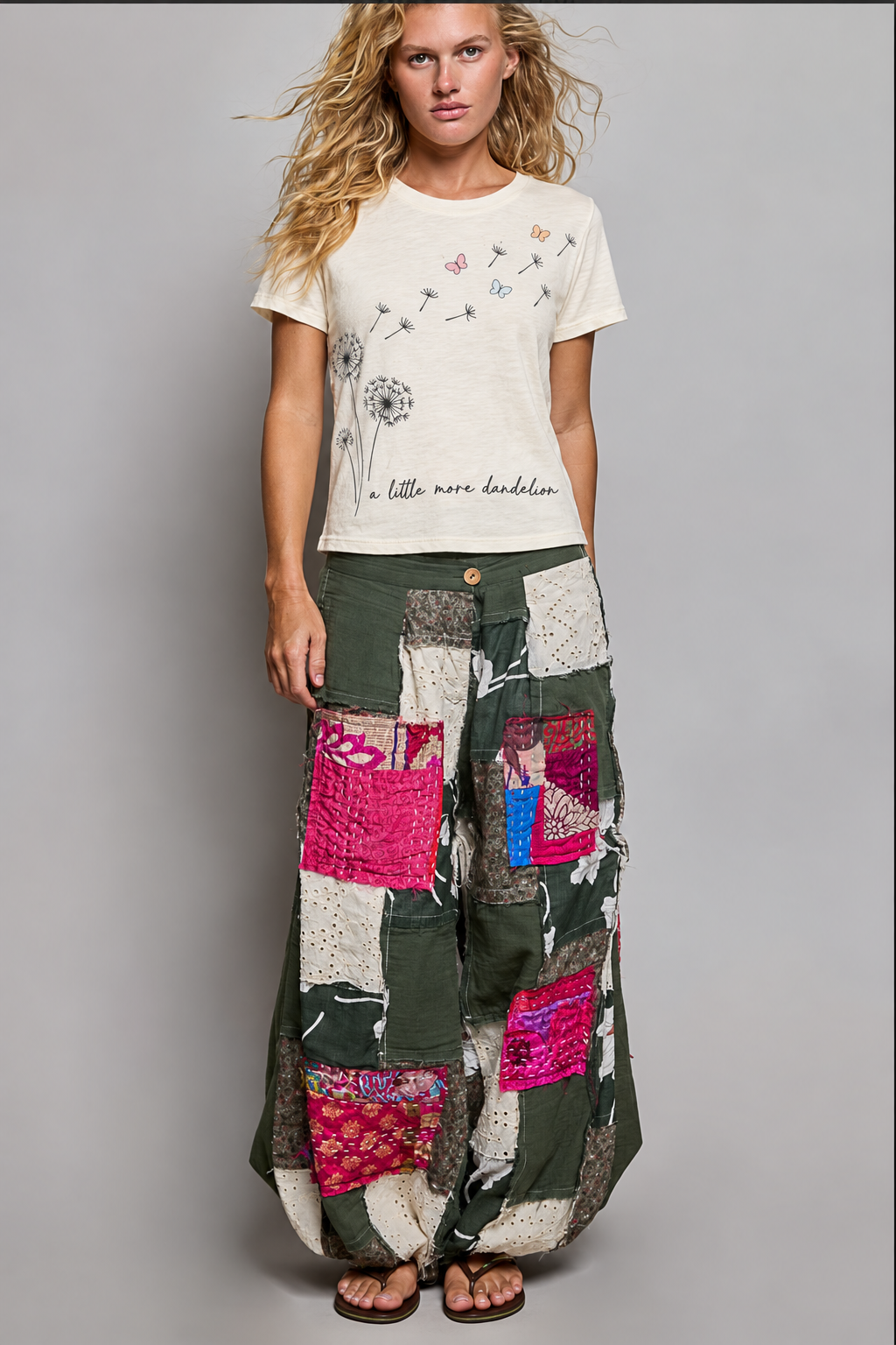 Olive patchwork balloon pants styled with an untucked dandelion tee