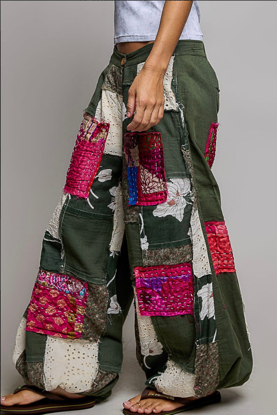 Side view of olive patchwork pants