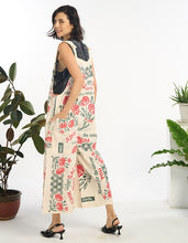 Back view of model wearing the Poppy vintage feed sack wide-leg jumpsuit