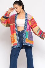 Full fit view of the colorful Kantha quilted sari jacket