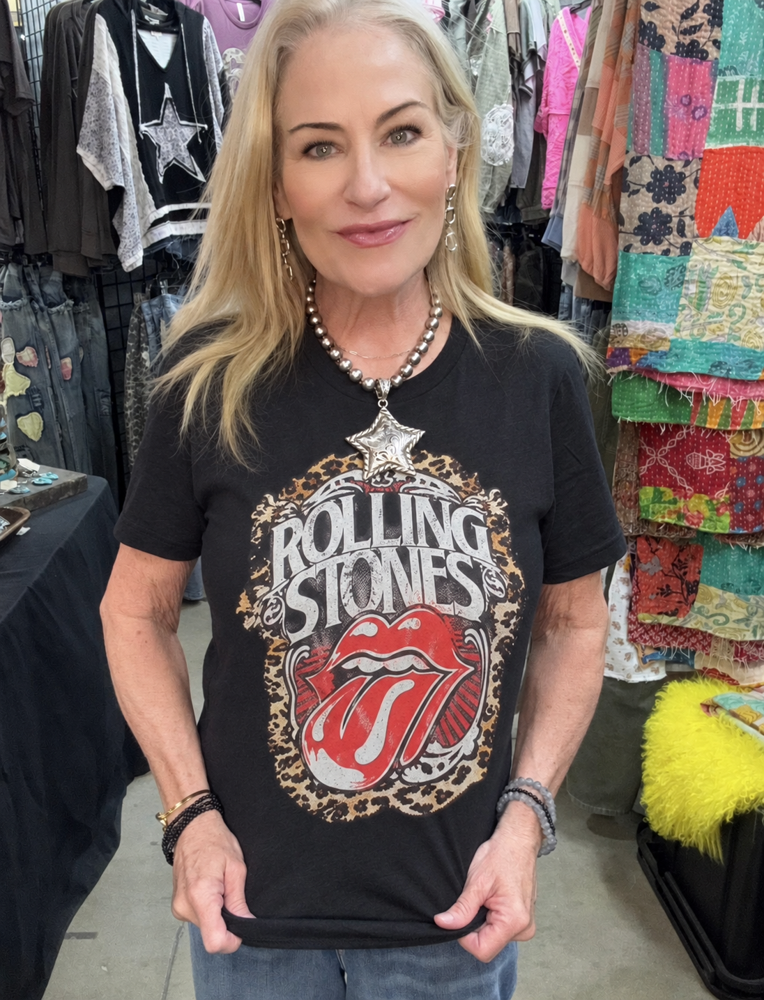 Kimberly wearing a black Rolling Stones graphic T-shirt