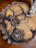 Silver-tone Western sacred heart pendant necklace with hand-knotted silver metal beads