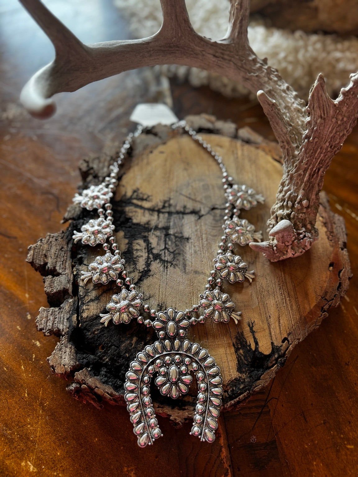 Silver-tone western floral squash blossom necklace with large naja pendant