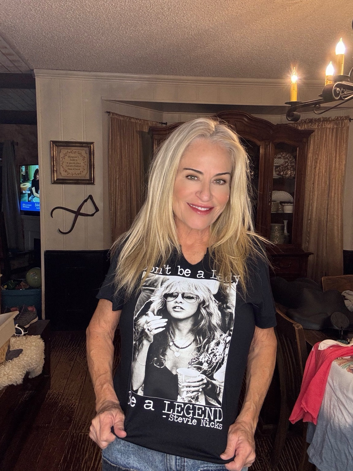 Black tee with a monochrome Stevie Nicks portrait and Don't be a Lady, Be a LEGEND lettering.