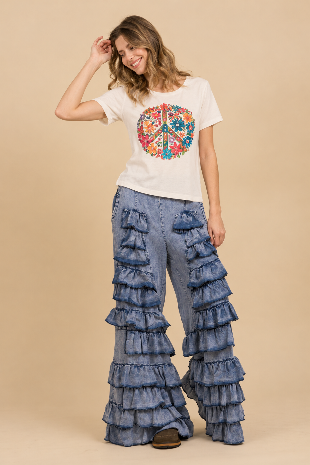 Light denim tiered ruffle pants styled with floral peace tee