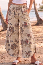 Saddle Story cowboy print tulip pants close view
