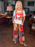 Woodstock tee styled with colorful cotton patchwork pants